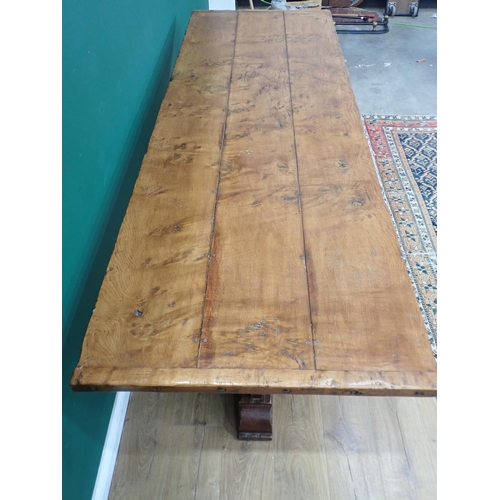 575 - A burr oak Refectory Table in 16th Century style with three plank cleated top raised on two cross-fo... 