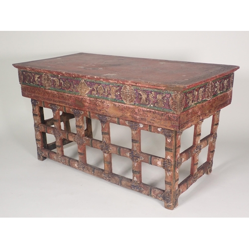 576 - A Chinese Scribe's Table with red lacquered and painted detail having two frieze drawers with slidin... 