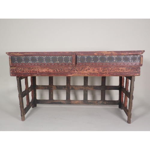 576 - A Chinese Scribe's Table with red lacquered and painted detail having two frieze drawers with slidin... 