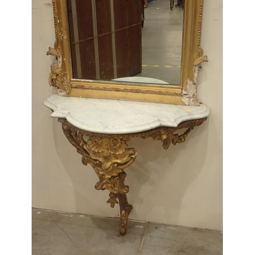 577 - A pair of 18th Century gilt Pier Mirrors with console base, having pierced and scrolled surmounts, b... 