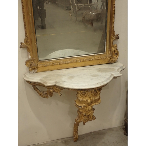 577 - A pair of 18th Century gilt Pier Mirrors with console base, having pierced and scrolled surmounts, b... 