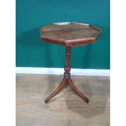 578 - An antique Candle Stand with octagonal yew top with gallery on vase turned oak column and elm tripod... 