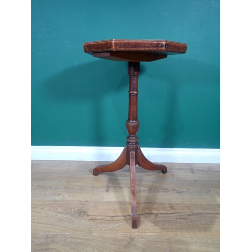 578 - An antique Candle Stand with octagonal yew top with gallery on vase turned oak column and elm tripod... 