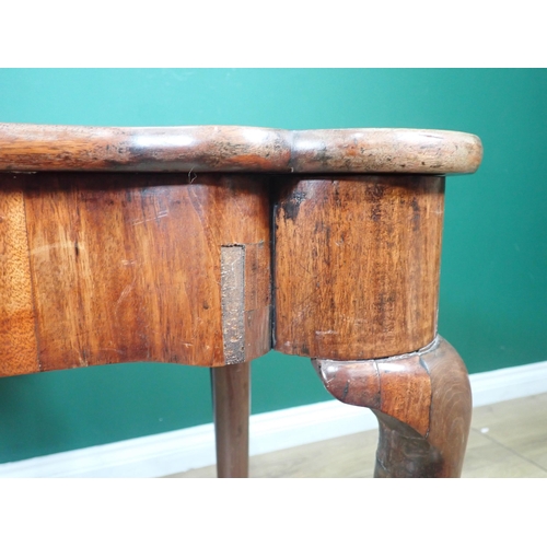 584 - A Georgian mahogany Card Table with shaped fold-over top enclosing baize lining and counter wells, r... 