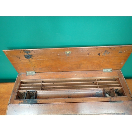 592 - An unusual Clerk's Desk in walnut by James Shoolbred & Co with central sloping hinged desk flanked b... 