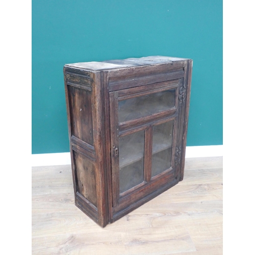 594 - A 17th Century and later oak and glazed Wall Cupboard with channel moulded frame 2ft 11in H x 2ft 5i... 