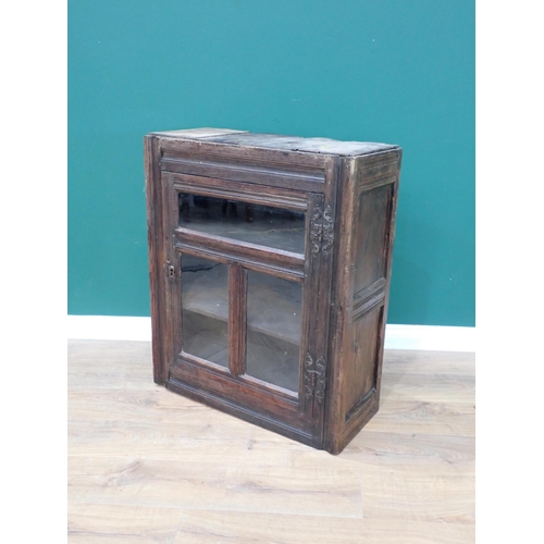 594 - A 17th Century and later oak and glazed Wall Cupboard with channel moulded frame 2ft 11in H x 2ft 5i... 