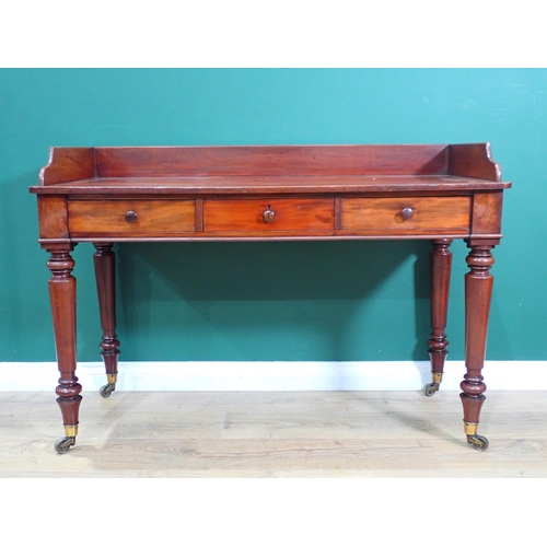 630 - A 19th Century mahogany Gillows Washstand with raised back fitted three drawers on turned tapering s... 