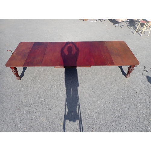 638 - A large 19th Century mahogany extending Dining Table by Joseph Fitter, Birmingham, with patent wind-... 