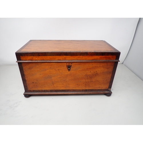 645 - A 19th Century satinwood Tea Caddy with rosewood banding, the hinged lid enclosing two lidded boxes ... 