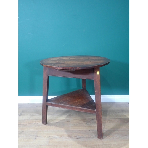 649 - An antique fruitwood, elm, etc, Cricket Table, with circular top, triangular under tier on splayed l... 