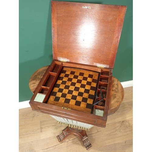 650 - A 19th Century Games/Work Table with hinged cover opening to reveal a games board and raised on squa... 