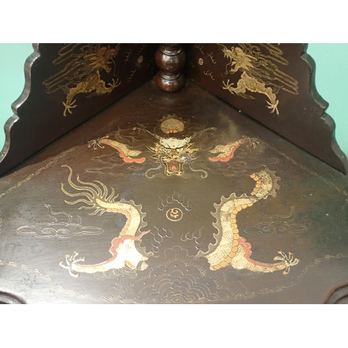 652 - A 19th Century ebonised Chinoiserie five tier graduated Whatnot decorated dragons and warriors 5ft 3... 