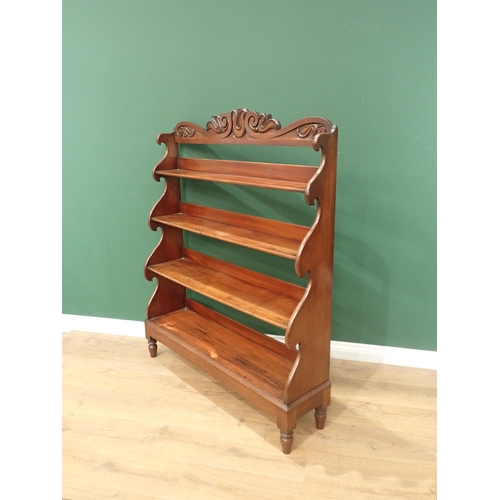 656 - A 19th Century mahogany Waterfall Bookcase with scroll carved top and raised on turned supports 4ft ... 