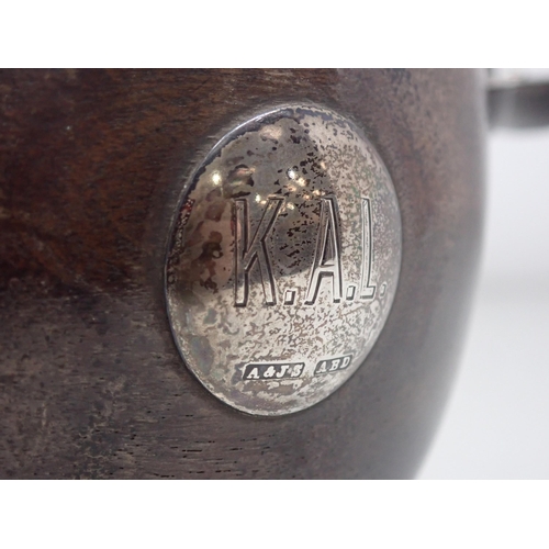 665 - A Scottish Treen Quaich with silver mounts bearing the initials 