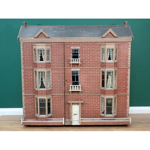 684 - A large Victorian three storey Doll's House bay windows and balconies, having double hinged front, 4... 