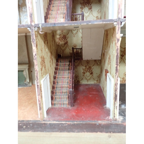 684 - A large Victorian three storey Doll's House bay windows and balconies, having double hinged front, 4... 