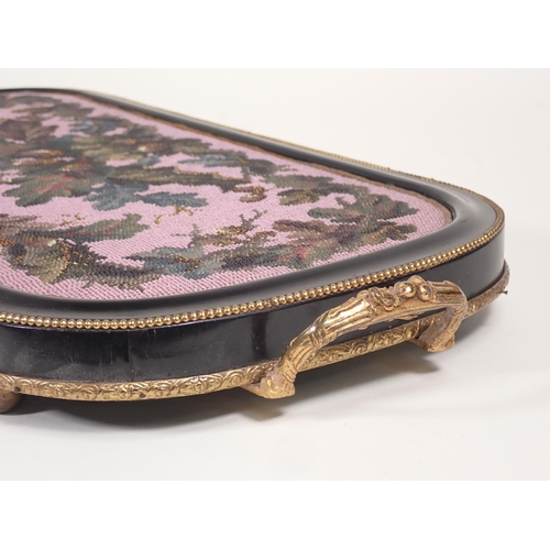 711 - A 19th Century beadwork Tray with ebonised and beaded frame and two gilt metal handles 2ft W