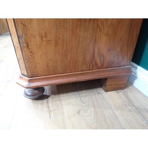 730 - A 19th Century Biedermeier Chest in walnut with shaped surmount above seven crossbanded graduated dr... 