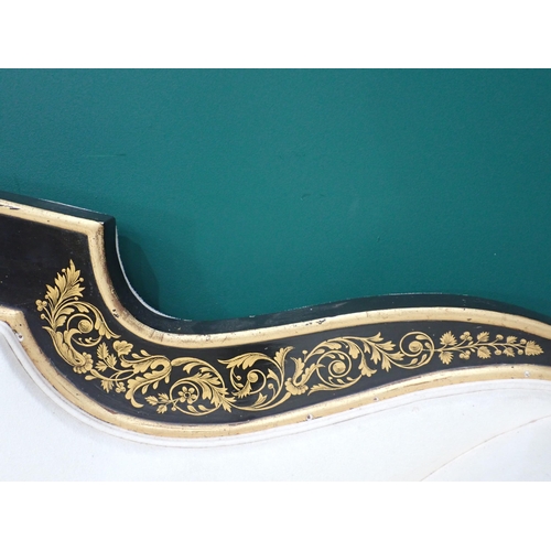 735 - A Regency style large Sofa with ebonised frame painted dolphins in gilt and with floral motifs, 7ft ... 