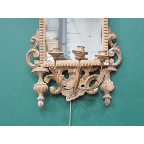 744 - An 18th Century pine Wall Mirror with scrolled acanthus leaf design and three light sconces 3ft H x ... 