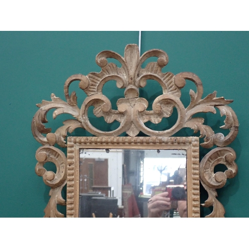 744 - An 18th Century pine Wall Mirror with scrolled acanthus leaf design and three light sconces 3ft H x ... 