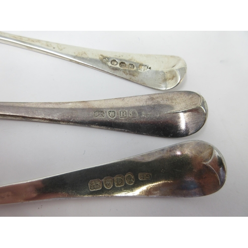 77 - Two pairs of George III silver Table Spoons, old English pattern, London 1797 and 1799, and a Sauce ... 