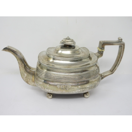 93 - A George III silver Teapot of boat shape on ball feet, Exeter 1813, dented, 640gms