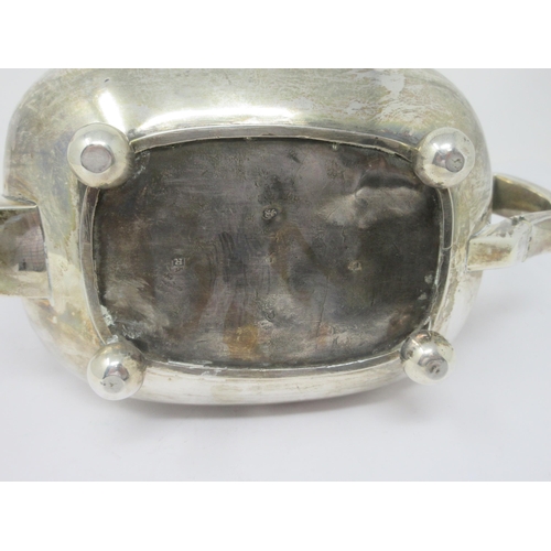 93 - A George III silver Teapot of boat shape on ball feet, Exeter 1813, dented, 640gms