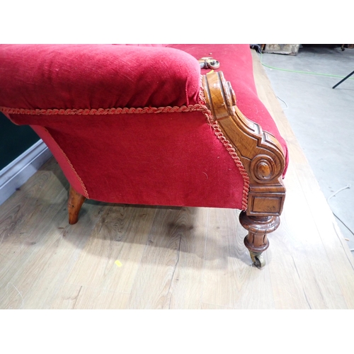 646 - A 19th Century Chesterfield Settee in the manner of Gillows with button back upholstery with scroll ... 