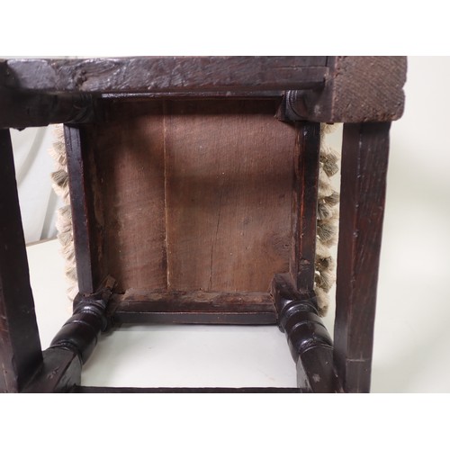 574 - A Charles II, c.1680 joined oak Stool with later upholstered top above leafage carved arcaded frieze... 