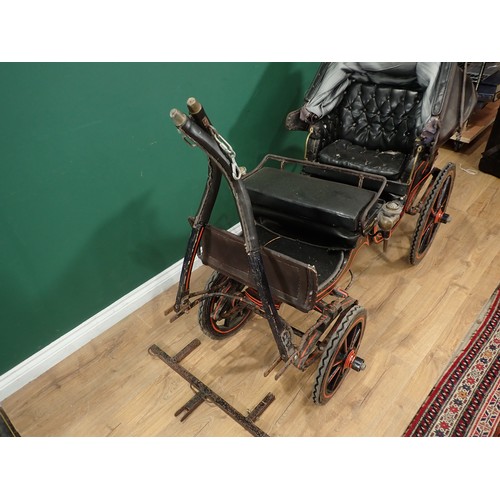 674 - A painted Child's Carriage, with folding canopy button upholstered back and seat,  and with two smal... 