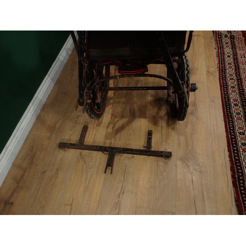 674 - A painted Child's Carriage, with folding canopy button upholstered back and seat,  and with two smal... 