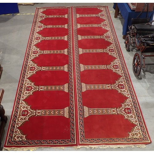 505A - A pair of long red ground Runners with design of repeating floral pillars, 17ft 8in L x 4ft1in W