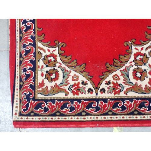 505A - A pair of long red ground Runners with design of repeating floral pillars, 17ft 8in L x 4ft1in W