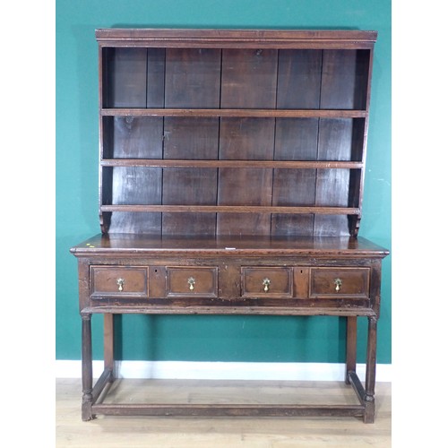 704 - A late 17th/early 18th Century and later oak Dresser, the plate rack with moulded cornice and three ... 