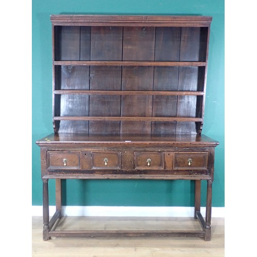 704 - A late 17th/early 18th Century and later oak Dresser, the plate rack with moulded cornice and three ... 