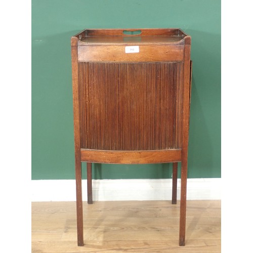 713 - A Georgian mahogany bow front Bedside Cabinet, the tray top with three handles and with sliding tamb... 