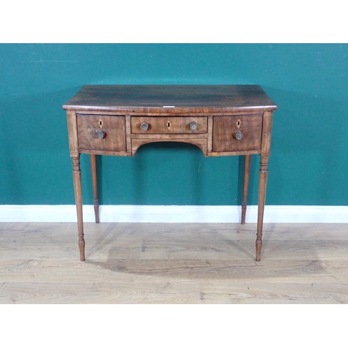 722 - A Georgian mahogany bow front Dressing Table, fitted three drawers with inlaid escutcheons around ar... 