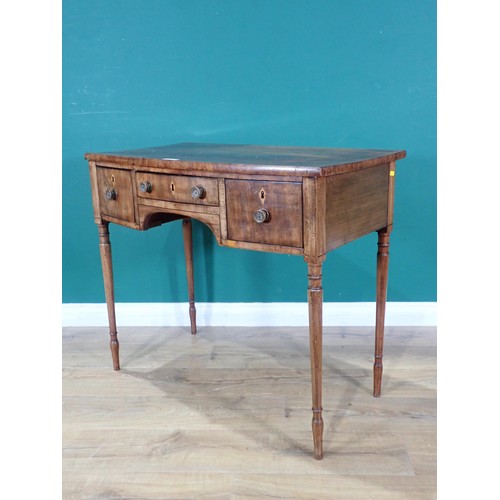 722 - A Georgian mahogany bow front Dressing Table, fitted three drawers with inlaid escutcheons around ar... 