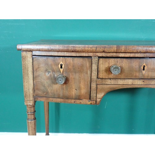 722 - A Georgian mahogany bow front Dressing Table, fitted three drawers with inlaid escutcheons around ar... 