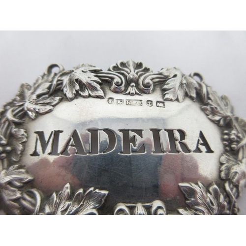 27 - A Victorian silver escutcheon Label, Sherry, Birmingham 1846, maker: George Unite, a Madeira Label, ... 