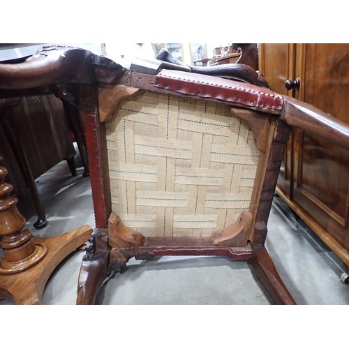 615 - A George III mahogany Elbow Chair in the Chippendale style with leafage carving and leather seat mou... 