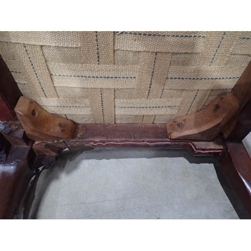 615 - A George III mahogany Elbow Chair in the Chippendale style with leafage carving and leather seat mou... 