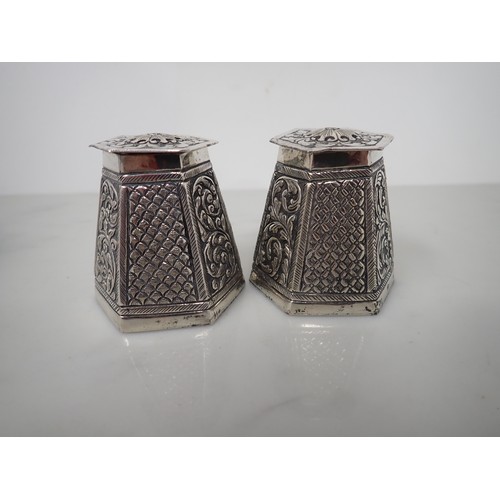 119 - A pair of Eastern silver hexagonal lidded Pots, leafage scroll engraved, a small Indian Coffee Pot, ... 