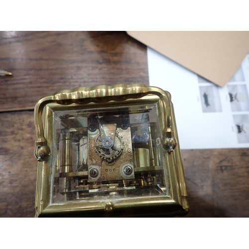 537 - An antique French brass cased Carriage Clock with bevelled plate glass, stamped Made in Paris 5in H ... 