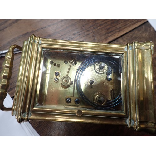 537 - An antique French brass cased Carriage Clock with bevelled plate glass, stamped Made in Paris 5in H ... 