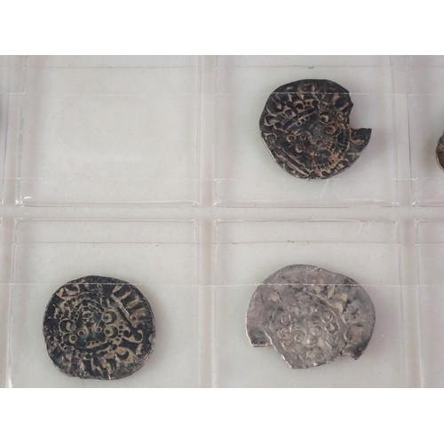 129 - A collection of twenty one long and short cross hammered silver Coins, to income Henry III void long... 