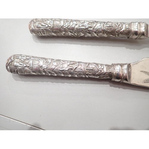 111 - A pair of Chinese silver Fish Servers, marked for Luen Wo, Shanghai, both with hollow cast handles, ... 