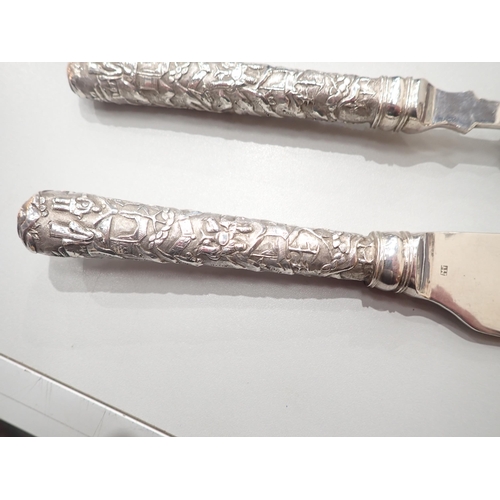 111 - A pair of Chinese silver Fish Servers, marked for Luen Wo, Shanghai, both with hollow cast handles, ... 